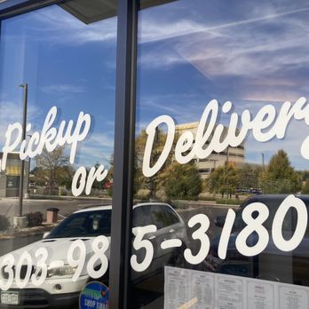 Jade Cafe - the reflection of a car in the window - Chinese Near Me - Denver, Colorado