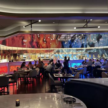 Hell's Kitchen - View of the red and blue kitchen - New American Near Me - Atlantic City, New Jersey