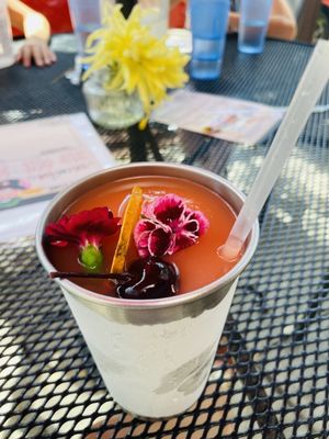 Photo of Ranalli's of Andersonville - Chicago, IL, US. Frozen Mai Tai with edible flowers.