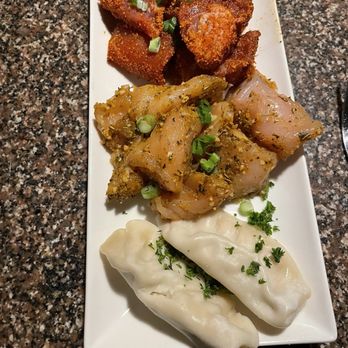 The Melting Pot - Chicken Potstickers, Memphis-Style Dry Rub Pork, Herb-Crusted Chicken Breast - Fondue Near Me - Raleigh, North Carolina