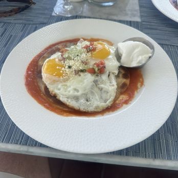 OCEAN2000 - Huevos rancheros. Minus the chorizo.  I added the sour cream. - New American Near Me - Fort Lauderdale, Florida