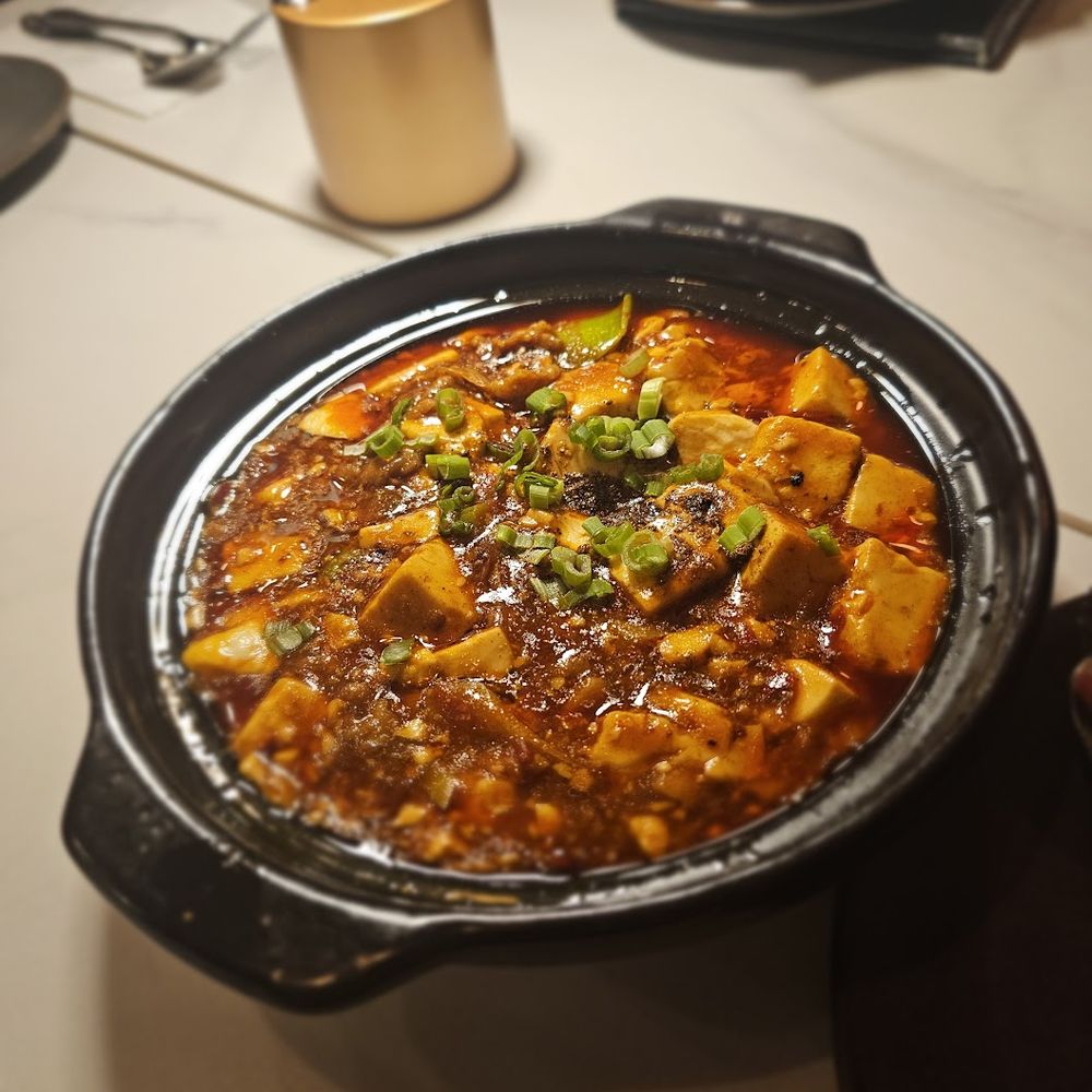 The Corner - Mapo Tofu. $15 without meat or $22 with. They liked it and yes, it was tasty - Chinese Near Me - New York, New York The Corner - Mapo Tofu. $15 without meat or $22 with. They liked it and yes, it was tasty - Chinese Near Me - New York, New York
