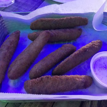 The Chubby Pickle - Fried pickle in blue light - Sports Bars Near Me - Highlands, New Jersey The Chubby Pickle - Fried pickle in blue light - Sports Bars Near Me - Highlands, New Jersey