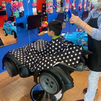 Kids Styles - Riding on a Batmobile! - Hair Salons Near Me - Azusa, California Kids Styles - Riding on a Batmobile! - Hair Salons Near Me - Azusa, California