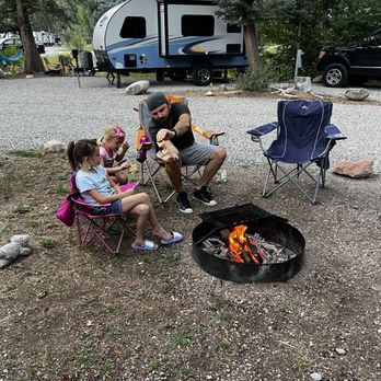 Elk Creek Campground - Fire pit with grill grate and nice new picnic tables. - Campgrounds Near Me - New Castle, Colorado