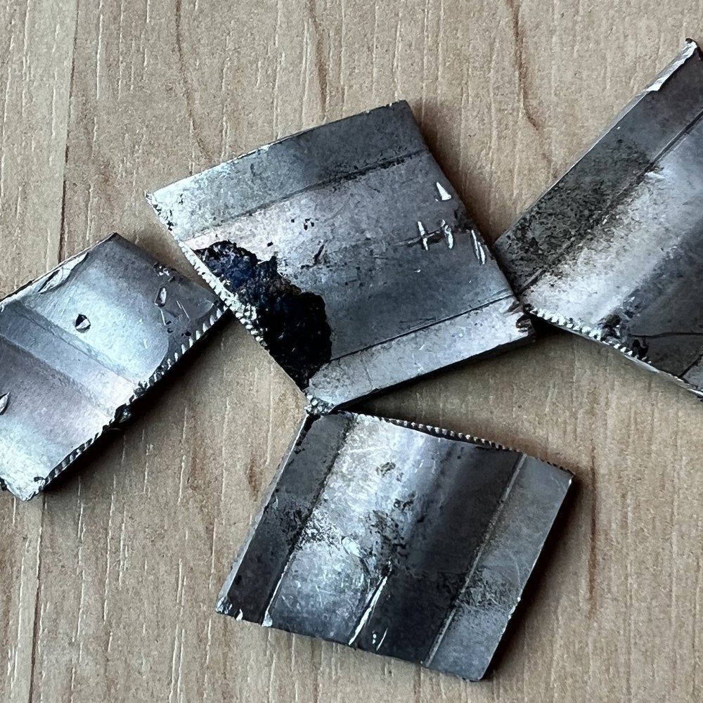 LeafFilter - Snipped gutter straps found in yard come spring - Gutter Services Near Me - Eden Prairie, Minnesota