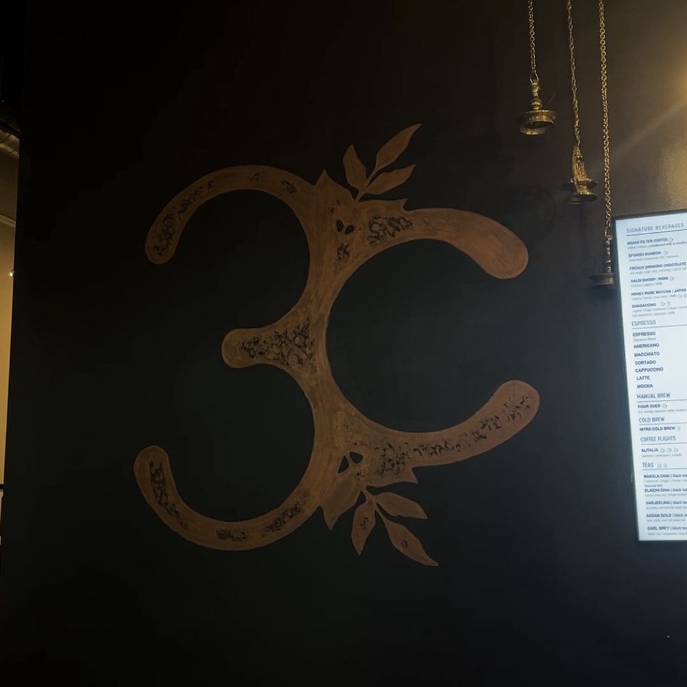 Third Culture Coffee - This is Om, a sacred symbol is Hinduism which is said to embody the essence of the universe. - Coffee & Tea Near Me - Bellevue, Washington Third Culture Coffee - This is Om, a sacred symbol is Hinduism which is said to embody the essence of the universe. - Coffee & Tea Near Me - Bellevue, Washington