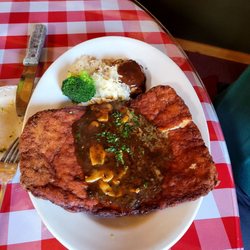 Dodge Peak and Tavern at the Lodge - Holy. Smokes. This Jägerschnitzel. Absolutely massive and delicious. This was the German Schnitzel with pork & hunter sauce.