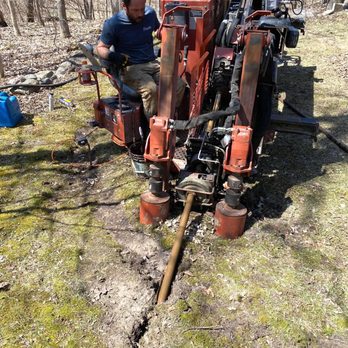 Torkelson Well Service - Drilling a waterline in horizontally under a driveway. - Well Drilling Near Me - Nevis, Minnesota Torkelson Well Service - Drilling a waterline in horizontally under a driveway. - Well Drilling Near Me - Nevis, Minnesota
