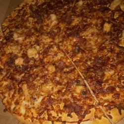Domino's Pizza - Look at how burnt and dry looking this is...Oh yeah here is the joke. This was suppose to be the pizza I received as a credit!!!