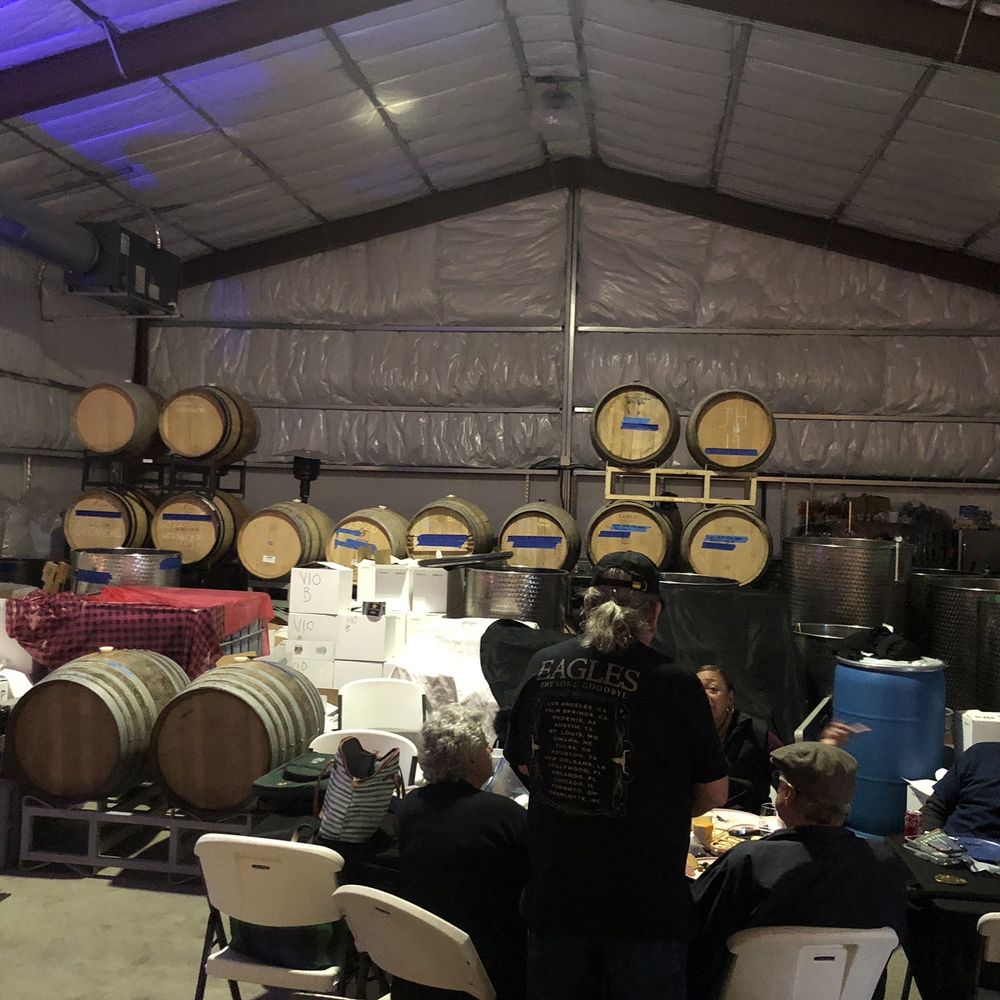 Golden Star Vineyards - a group of people sitting around a table - Wineries Near Me - Littlerock, California