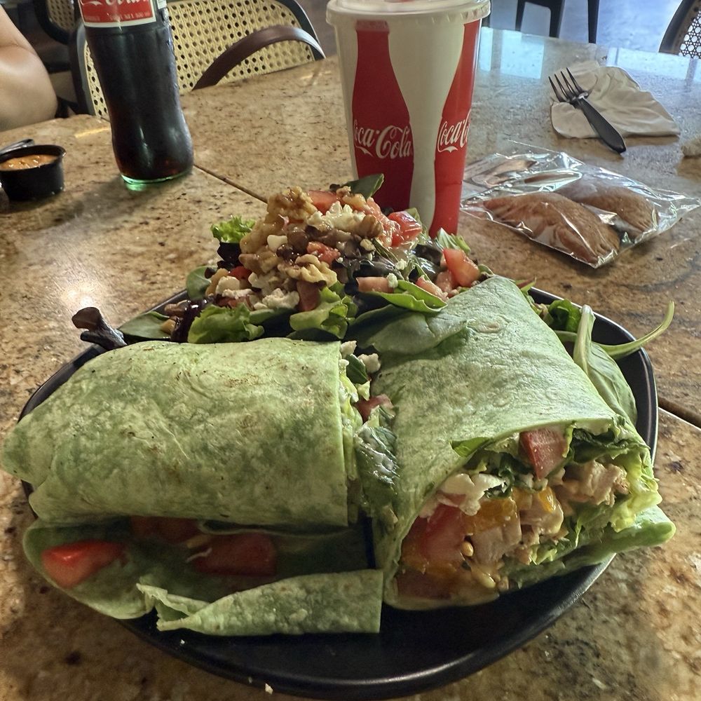 Oriental chicken wrap with a side summer salad Oriental chicken wrap with a side summer salad