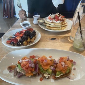 Yolk - Las Colinas - Salmon avocado toast, very berry French toast(single) and strawberry cheesecake pancakes. - Coffee & Tea Near Me - Irving, Texas Yolk - Las Colinas - Salmon avocado toast, very berry French toast(single) and strawberry cheesecake pancakes. - Coffee & Tea Near Me - Irving, Texas