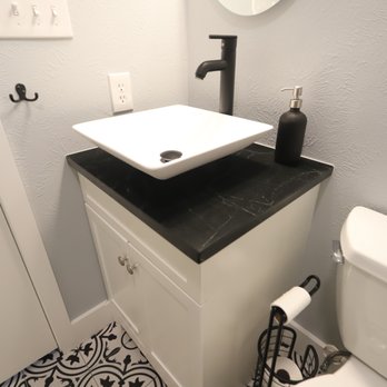 Prestige Contractors - a bathroom with a sink and toilet - General Contractors Near Me - Castle Rock, Colorado