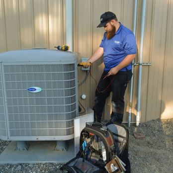 Bassett Services - Technician working on HVAC Tune-Up - Heating & Air Conditioning/HVAC Near Me - Plainfield, Indiana Bassett Services - Technician working on HVAC Tune-Up - Heating & Air Conditioning/HVAC Near Me - Plainfield, Indiana