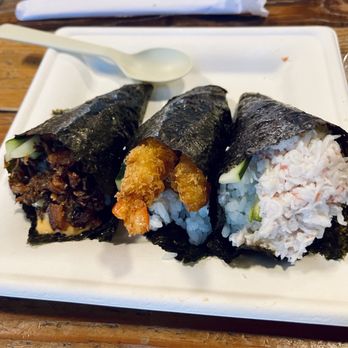 Umi Hand Roll Bar - Hand Roll Trio - Salmon Skin, Shrimp Tempura, California (left to right) - Sushi Bars Near Me - San Jose, California Umi Hand Roll Bar - Hand Roll Trio - Salmon Skin, Shrimp Tempura, California (left to right) - Sushi Bars Near Me - San Jose, California