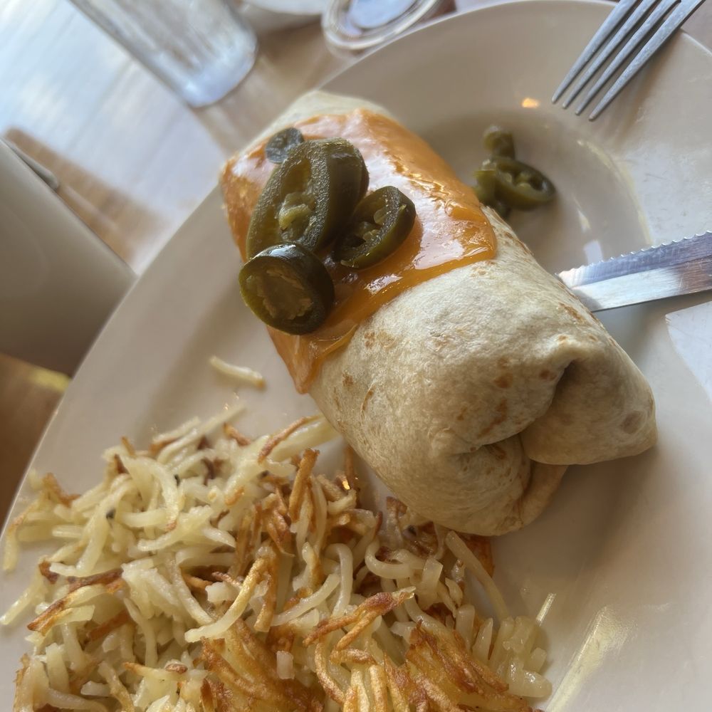 Stacked - Breakfast burrito with hashbrowns - Breakfast & Brunch Near Me - Oak Lawn, Illinois Stacked - Breakfast burrito with hashbrowns - Breakfast & Brunch Near Me - Oak Lawn, Illinois