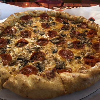 Cabin Pizza - The world famous PMS (pep, mush, sausage) - Pizza Near Me - Grand Rivers, Kentucky Cabin Pizza - The world famous PMS (pep, mush, sausage) - Pizza Near Me - Grand Rivers, Kentucky