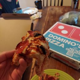 Severely undercooked pizza.