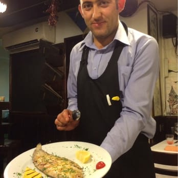 La Panocia d'Oro - Our waiter, with Grilled Sole, prior to the deboning - Seafood Near Me - Venezia, VE La Panocia d'Oro - Our waiter, with Grilled Sole, prior to the deboning - Seafood Near Me - Venezia, VE