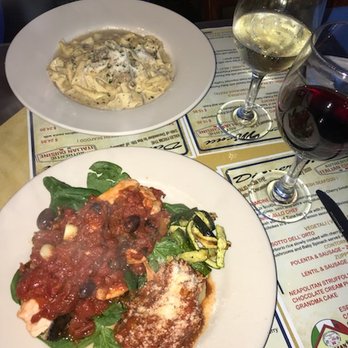 Antonio & Vittoria - Salmone Livornese. Fresh Scottosh salmon with poached cherry tomatoes, black olives, basil, and EV olive oil with a side of polenta. - Wine Tasting Classes Near Me - Satellite Beach, Florida