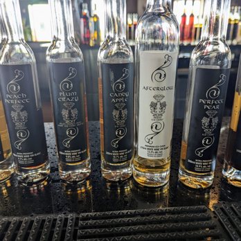 Atlantis Niagara Wines - a row of bottles - Wine Tasting Room Near Me - Lincoln, Ontario Atlantis Niagara Wines - a row of bottles - Wine Tasting Room Near Me - Lincoln, Ontario