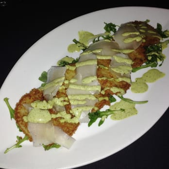The Grill at One - Fried green tomatoes finished with arugula and manchego cheese. Delicious! - New American Near Me - Rochester, New York The Grill at One - Fried green tomatoes finished with arugula and manchego cheese. Delicious! - New American Near Me - Rochester, New York
