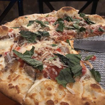 Rustique Pizzeria + Lounge - Sausage, carmeliz onion, basil - Pizza Near Me - Green Bay, Wisconsin Rustique Pizzeria + Lounge - Sausage, carmeliz onion, basil - Pizza Near Me - Green Bay, Wisconsin