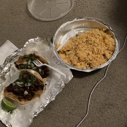 Two steak tacos and rice Two steak tacos and rice