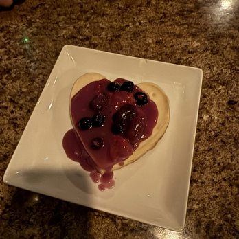 Massimo Italian Bar & Grill - Cheesecake with berry compote - Italian Near Me - Gig Harbor, Washington Massimo Italian Bar & Grill - Cheesecake with berry compote - Italian Near Me - Gig Harbor, Washington
