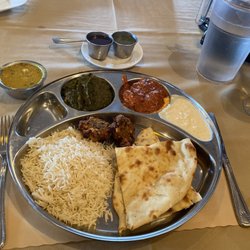 Nirvana Indian Bistro - Chicken Tikka Masala, Saag Paneer, Yellow Dal. Served with Rice, Pakora & Naan