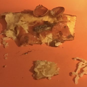 Shasta Pizza - a slice of pizza on an orange plate - Pizza Near Me - Anderson, California