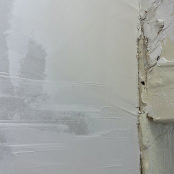 A1 Drywall - Not smooth or sealed at all. This wall isn't supposed to be textured at all. It's not supposed to have gaps either. - Drywall Installation & Repair Near Me - San Francisco, California