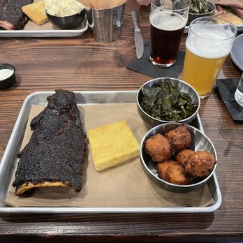Pinehurst Brewing Company - Railroad Ribs with collard greens and hushpuppies, and cornbread of course - Brewpubs Near Me - Pinehurst, North Carolina Pinehurst Brewing Company - Railroad Ribs with collard greens and hushpuppies, and cornbread of course - Brewpubs Near Me - Pinehurst, North Carolina