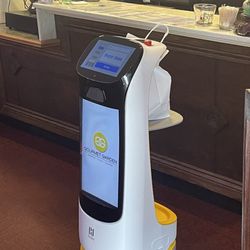 Gourmet Garden - This droid is programmed to bring take out orders from the kitchen up front