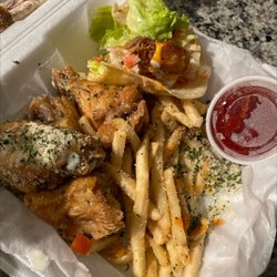 The Phoenix Bar and Lounge - Jumbo wings and butter fries AND fish tacos