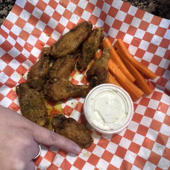 Long Wong's Dobson - My pinky compared to these embarrassing of wings they are handing out. - Chicken Wings Near Me - Mesa, Arizona