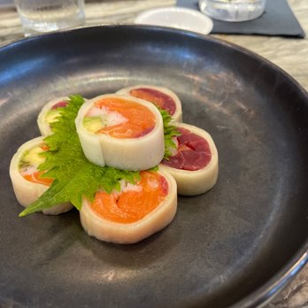 Fuji at WoC - Cucumber Wrapped Maki *(G)     (Tuna, salmon, avocado, and kanikama wrapped in fresh cucumber and drizzled in house special ponzu sauce) - Japanese Near Me - Quincy, Massachusetts