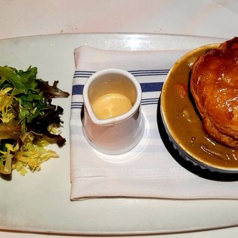 Bouchon - Lobster Pot Pie. It was ridiculously delicious! Huge chunk of lobster, perfect puff pastry, mediera sauce that puts it over the top. - French Near Me - Santa Barbara, California Bouchon - Lobster Pot Pie. It was ridiculously delicious! Huge chunk of lobster, perfect puff pastry, mediera sauce that puts it over the top. - French Near Me - Santa Barbara, California