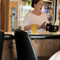 I'm sure she's somebody's cup of tea, but we brought my 79 year old mother in law here and this waitress was obscene. F-bomb after f-bomb.