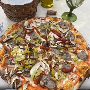 Rustico Ristorante - Pizza Boscaiola - added peppercini on it - Italian Near Me - Telluride, Colorado Rustico Ristorante - Pizza Boscaiola - added peppercini on it - Italian Near Me - Telluride, Colorado