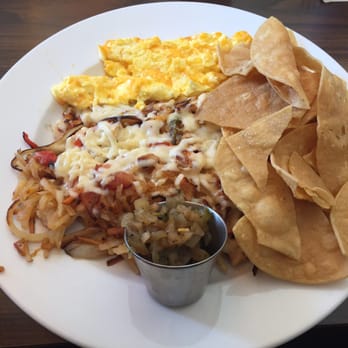 Hen House Eatery - Carnitas Hash w/o carnitas (replaced with chicken) Hash browns, tomatoes, peppers, onions, and carrots topped with chihuahua cheese - Breakfast & Brunch Near Me - Minneapolis, Minnesota Hen House Eatery - Carnitas Hash w/o carnitas (replaced with chicken) Hash browns, tomatoes, peppers, onions, and carrots topped with chihuahua cheese - Breakfast & Brunch Near Me - Minneapolis, Minnesota