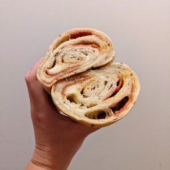 Great Harvest Bread - Look at the layers of pepperoni and cheese in this roll. - Bakeries Near Me - Northville, Michigan Great Harvest Bread - Look at the layers of pepperoni and cheese in this roll. - Bakeries Near Me - Northville, Michigan
