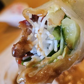 Viet Sub - Close-up of the inside of the Pork Spring Roll after taking a bite. A culinary masterpiece of simple yet tasty food. - Vietnamese Near Me - Roanoke, Virginia Viet Sub - Close-up of the inside of the Pork Spring Roll after taking a bite. A culinary masterpiece of simple yet tasty food. - Vietnamese Near Me - Roanoke, Virginia