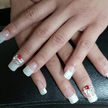 Tip Top Nails & Spa - My holidays pearl tips with glitter gel and crystal jewel. READY for NYE!! - Nail Salons Near Me - Norco, California Tip Top Nails & Spa - My holidays pearl tips with glitter gel and crystal jewel. READY for NYE!! - Nail Salons Near Me - Norco, California