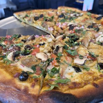 Firewater Sports Bar Cafe - CHICKEN TIKKA MASALA PIZZA - Sports Bars Near Me - Cedar Park, Texas Firewater Sports Bar Cafe - CHICKEN TIKKA MASALA PIZZA - Sports Bars Near Me - Cedar Park, Texas