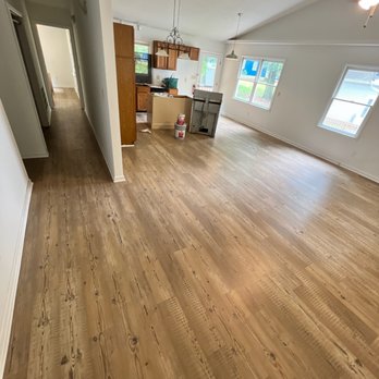 Triangle Flooring Center - Removed sheet vinyl and carpet. Installed new luxury vinyl plank throughout home - Carpeting Near Me - Carrboro, North Carolina