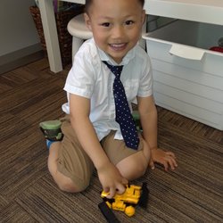 SmileHere Family Dental - Our patient of the day wins a prize he can't wait to test out!