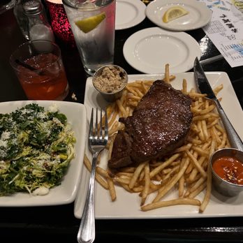 Scratch Kitchen & Cocktails - Sirloin steak and fries with kale and Brussels salad - New American Near Me - Norman, Oklahoma