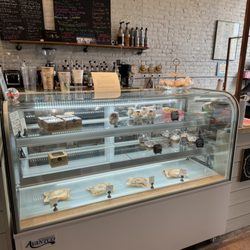 LJ’S Creations Cafe - Bakery display case with our most commonly sold items